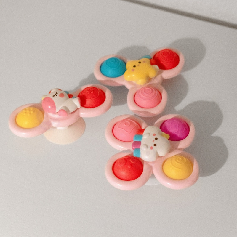 WOOPIE BABY Space Spinner Pop-it Sensory Toy Keičiamas 3 vnt. rožinės spalvos.