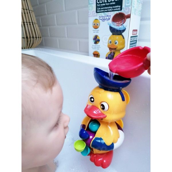 Игрушка для купания "Утенок Вупи Бэби" с вращающимся колесом и переливом